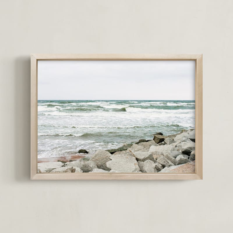 " 29/5000 White waves and rocky shore" by Lying on the grass in beautiful frame options and a variety of sizes.