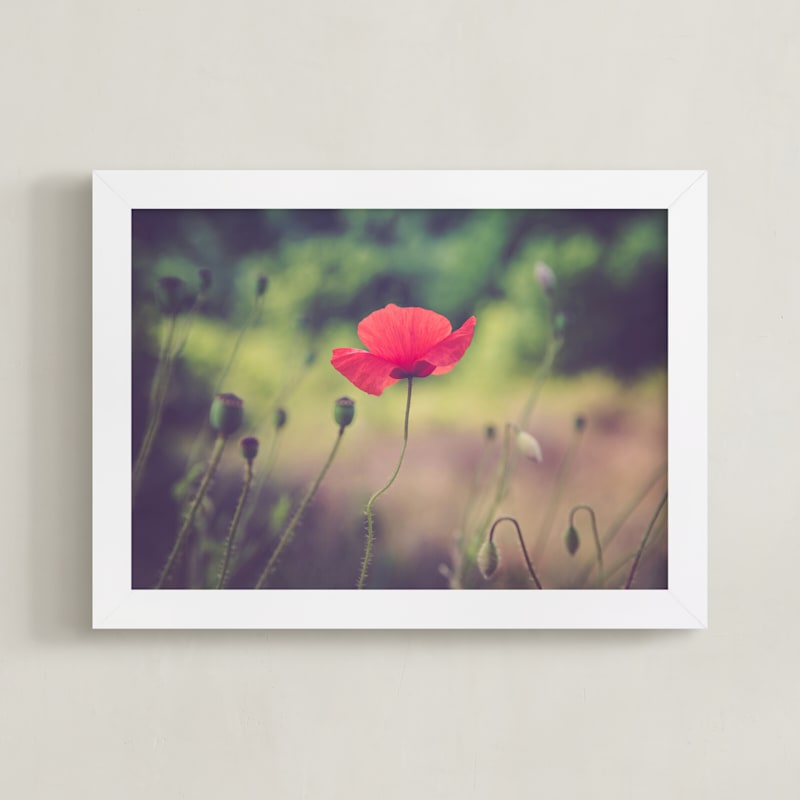 "Red Poppy Flower" - Art Print by Lying on the grass in beautiful frame options and a variety of sizes.