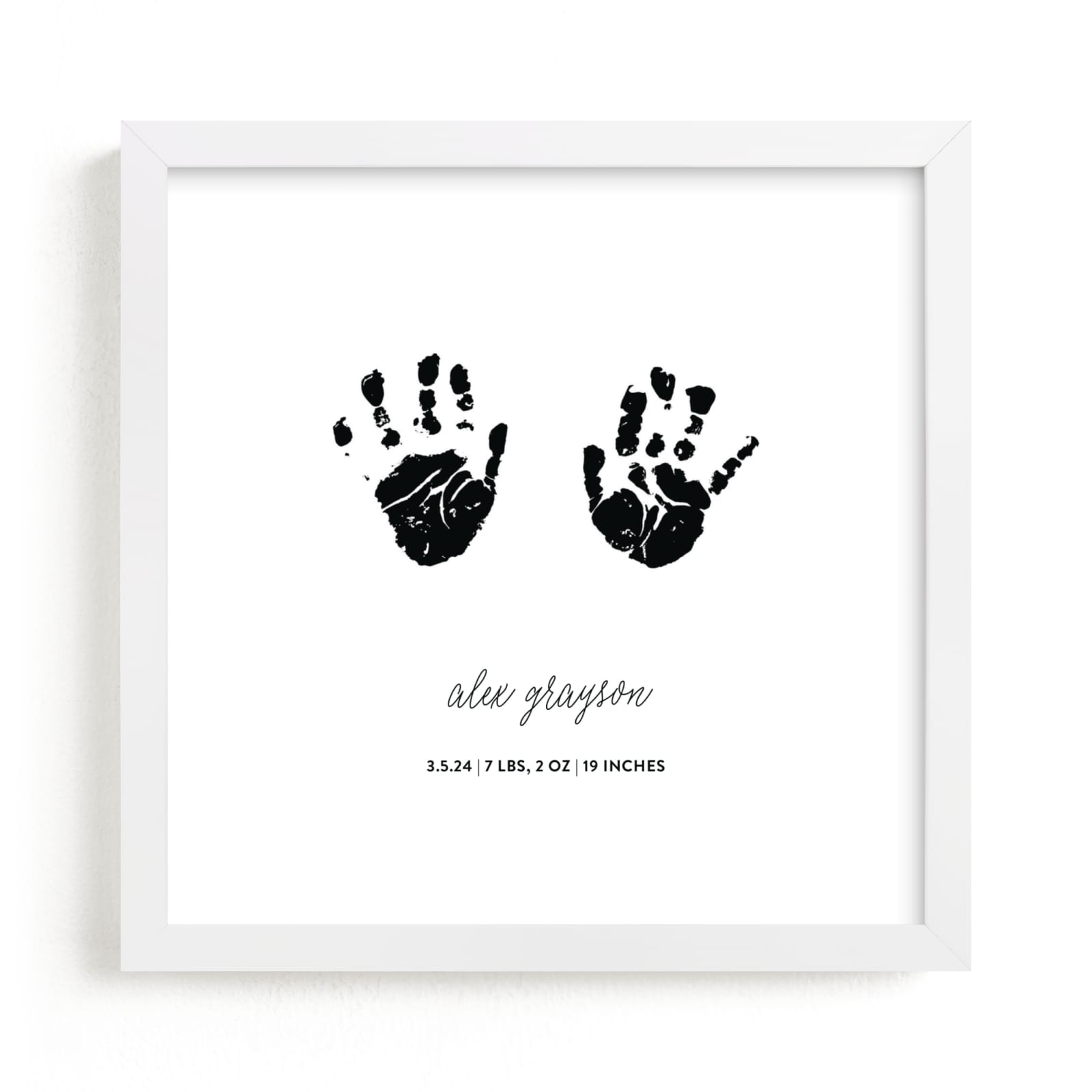 This is a black photos to art  by Minted called Custom Handprints as Art.