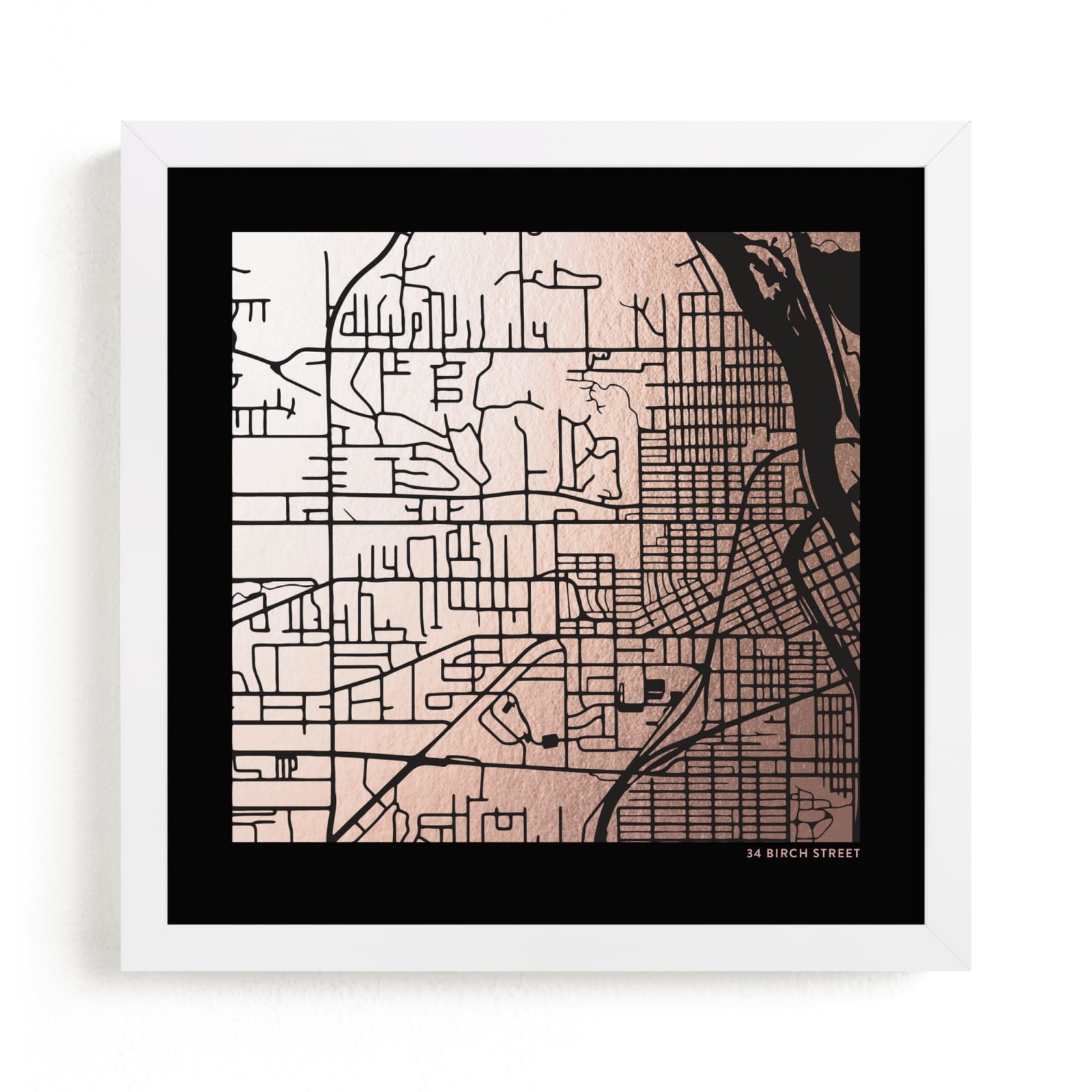 This is a rosegold custom map printing by Minted called Custom Map Filled Foil Art on Dark Paper.