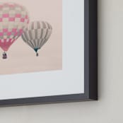 "Two Hot Air Balloons" - Art Print in subtle pink by Caroline Mint - Frame Close-up