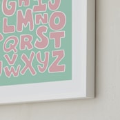 "Nursery Lettering Alphabet" - Art Print in Green and Pink by Luz Alliati - Frame Close-up