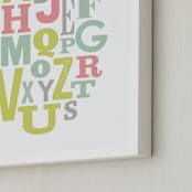 "Oval Alphabet" - Art Print in Rose by Leah Bisch - Frame Close-up