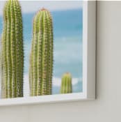 "Cactus at the Sea" - Art Print in light blue by Dariela Cruz - Frame Close-up