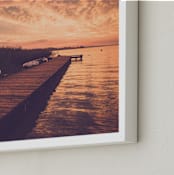 "Red sunset and boat" - Art Print in orange brick by Lying on the grass - Frame Close-up