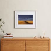 "Dirt Road Through a Wheat Field Under a Stormy Sky" - Art Print in Indigo Sky by Kathy Van Torne - In a Room