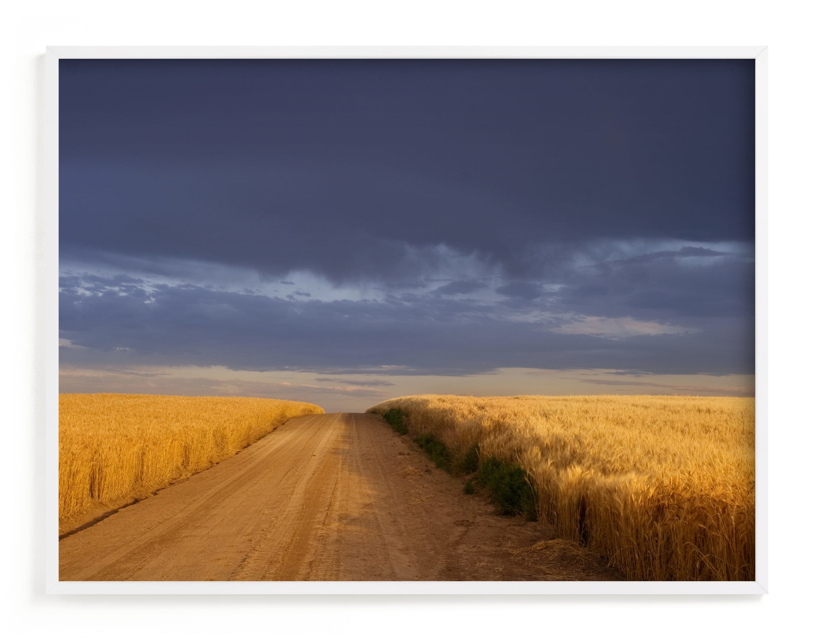 Dirt Road Through a Wheat Field Under a Stormy Sky Art Print